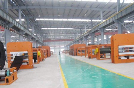 Curing press line for fabric cord rubber conveyor belt